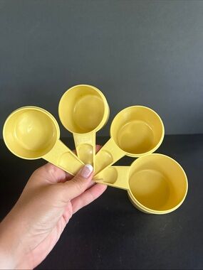 Yellow Plastic Tupperware Measuring Cups Set
